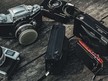 An assortment of antique cameras displayed together.