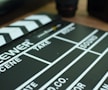 a close up of a movie clapper on a table