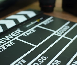 a close up of a movie clapper on a table