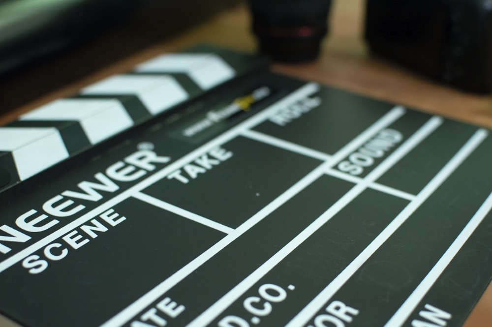 a close up of a movie clapper on a table