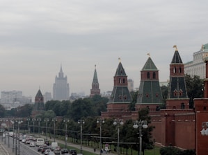 A cityscape of a European capital with prominent government buildings and busy streets.