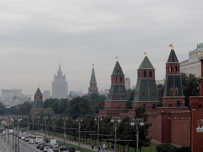 A cityscape of a European capital with prominent government buildings and busy streets.