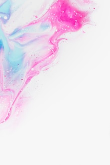 a white background with pink and blue paint