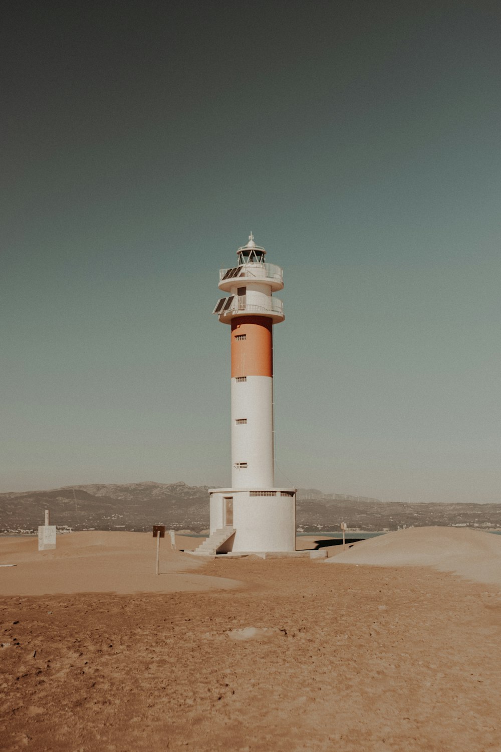 white and orange lighthouse