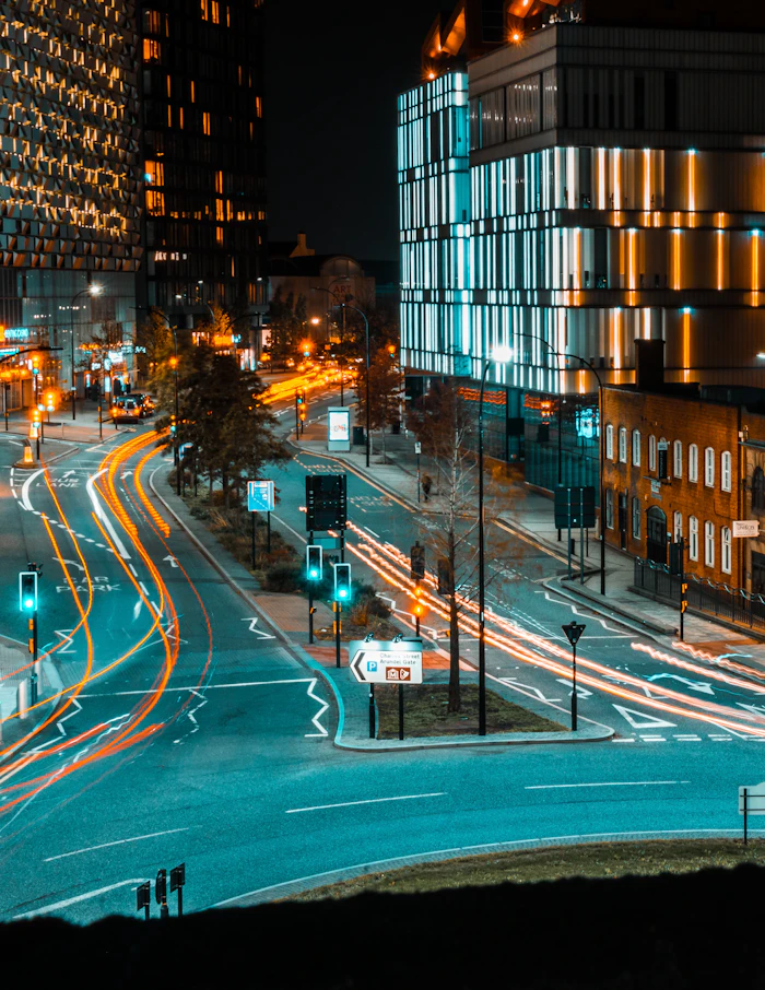 Light trails along a Sheffield city street after dark