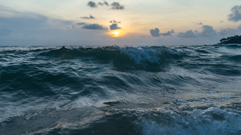 water waves during sunset