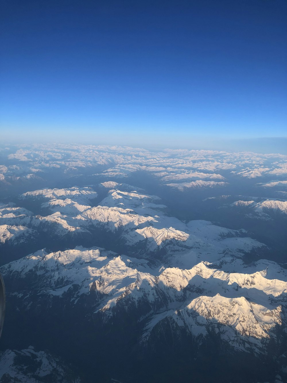 mountain covered with snow during daytime top-view photography