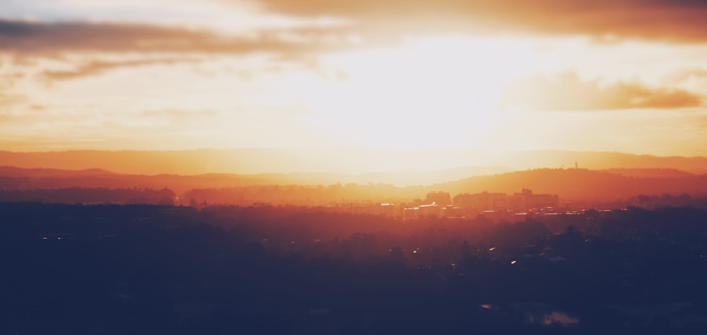 high rise buildings during sunrise