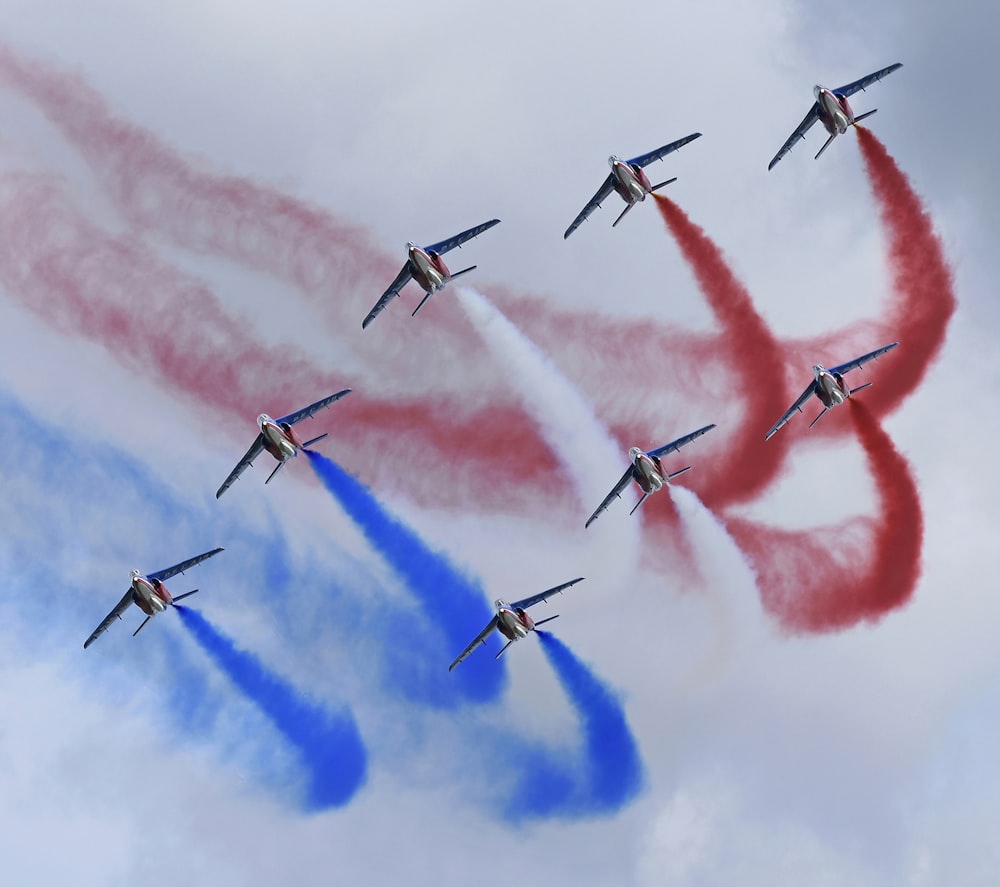 eight planes showing air exhibition during daytime