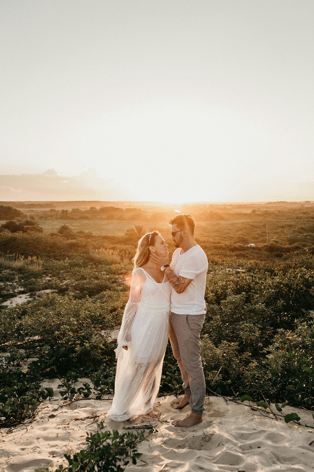 man and woman wearing white clothes