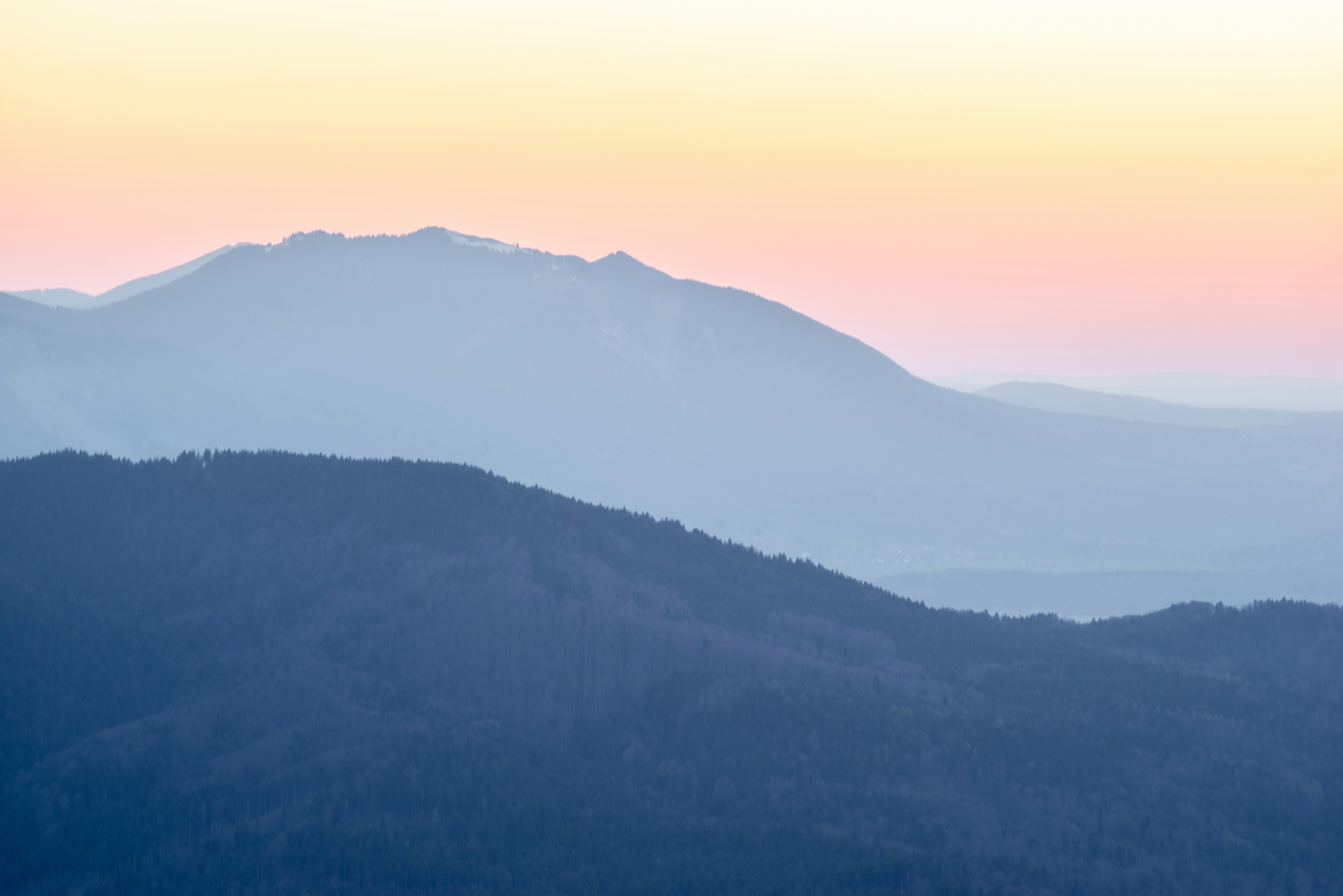 A view of a mountain range at sunset photo – Free Wallpaper Image on  Unsplash