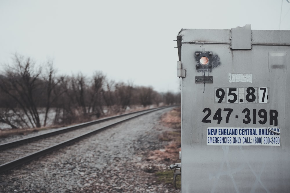 gray metal fame beside trail rails