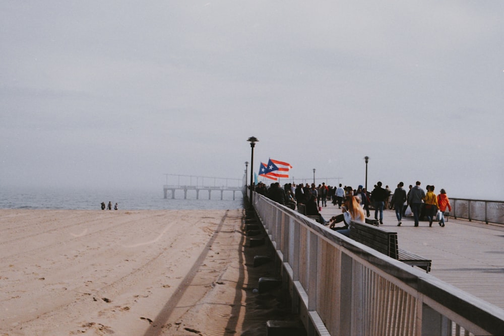 people gathering at the bridge