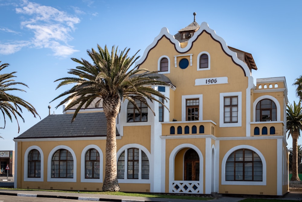 yellow and white 2-storey house