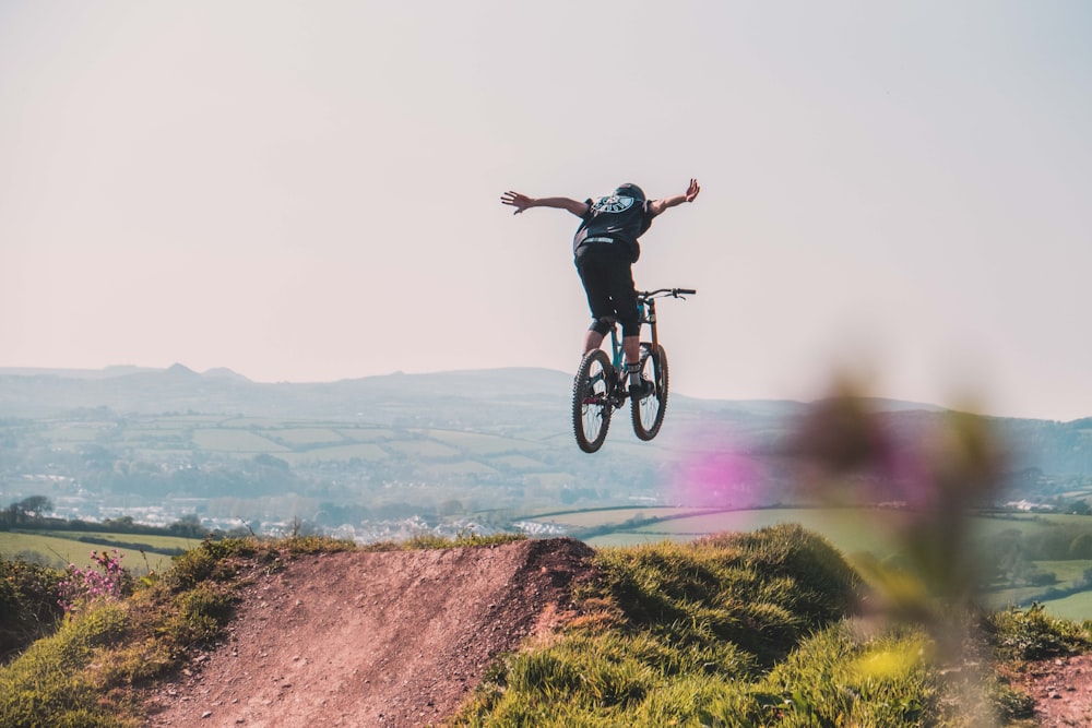 person riding on bike during daytime