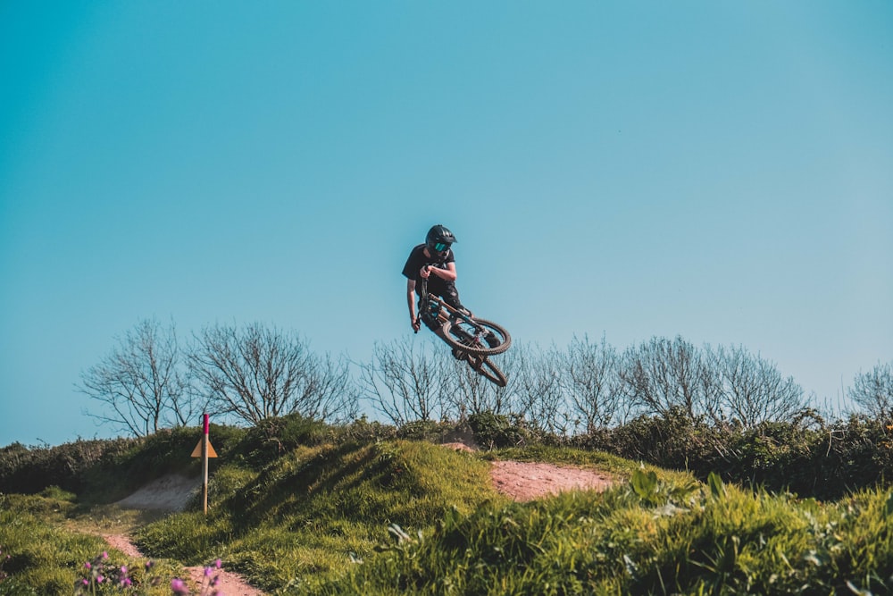 person cycling outdoors