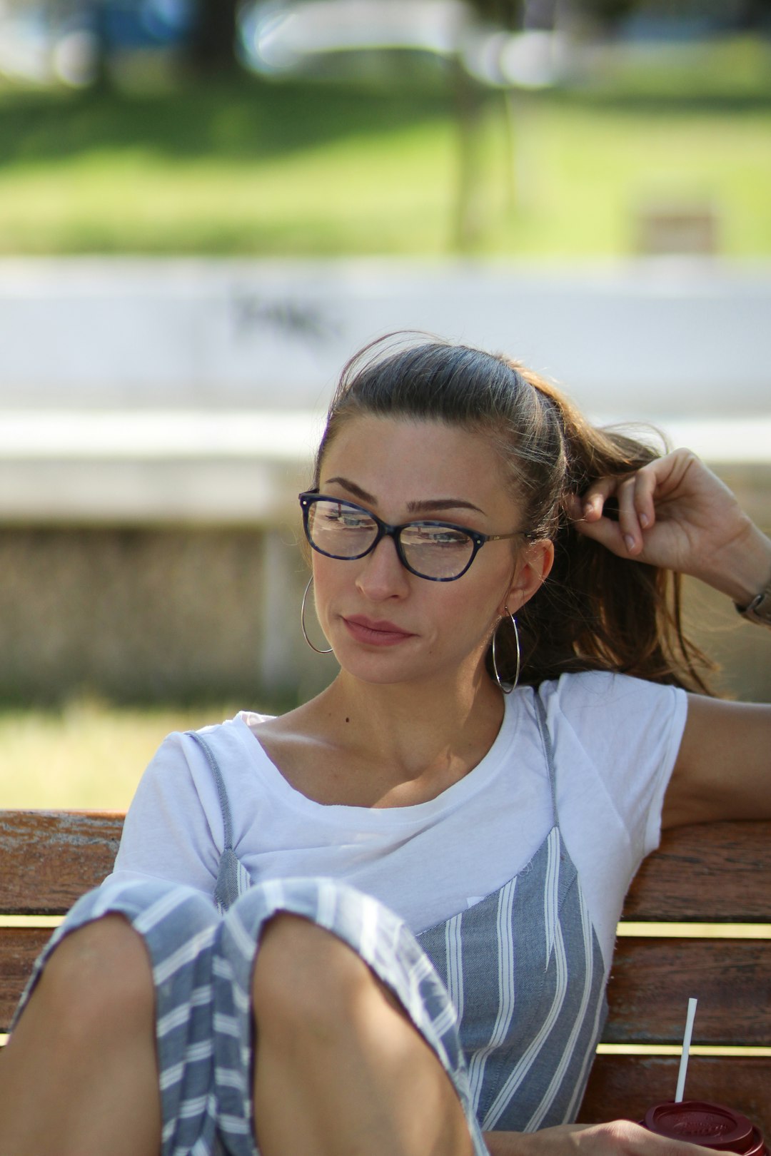 woman sitting on bench