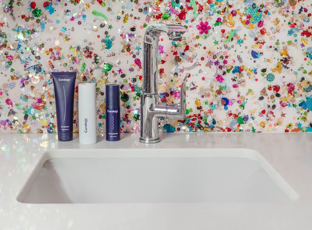 white ceramic sink with faucet