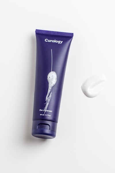 Bright citrus-toned skincare serum on a clean minimal background