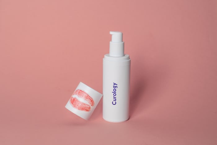 A White bottle of skincare product.