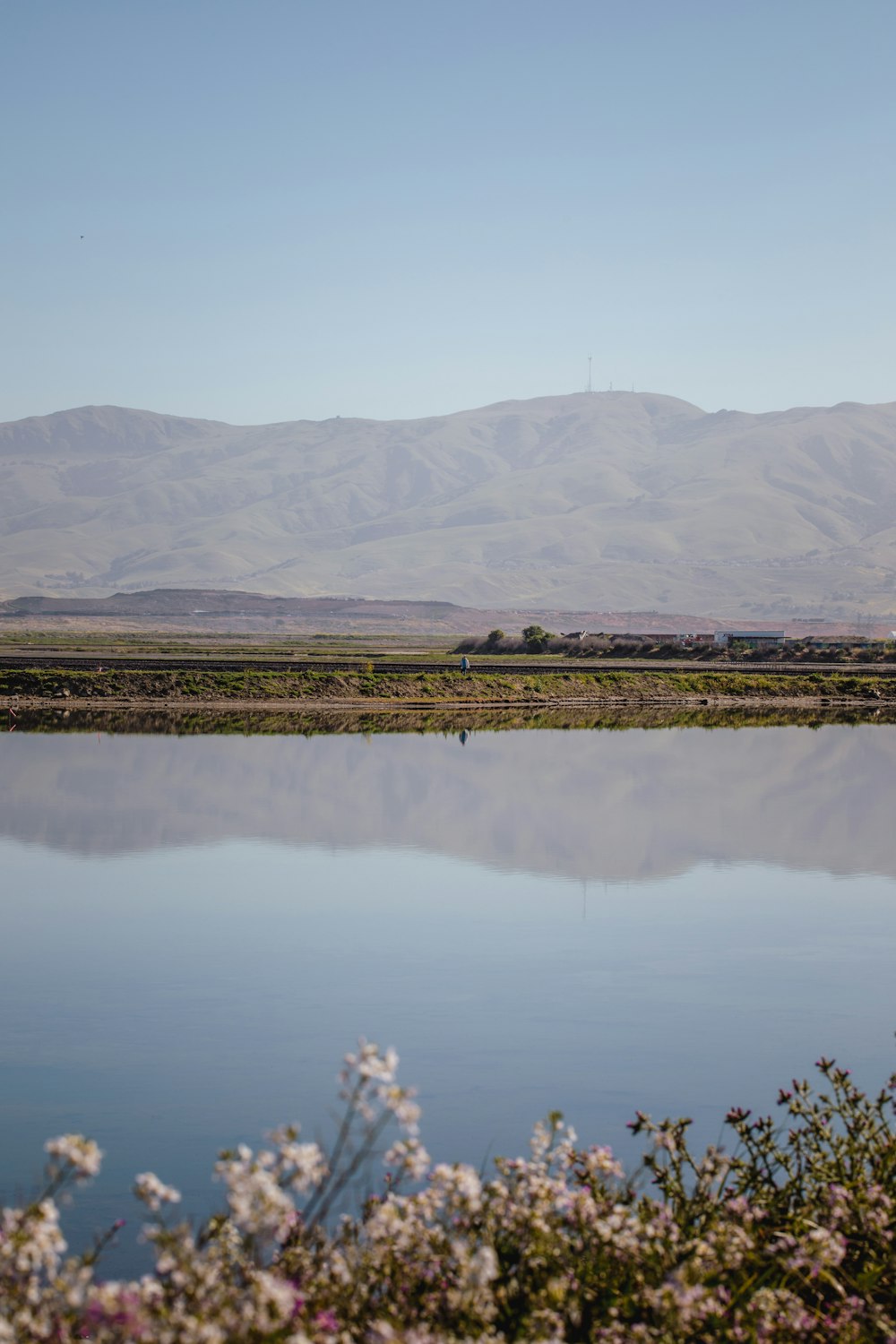 a large body of water surrounded by mountains