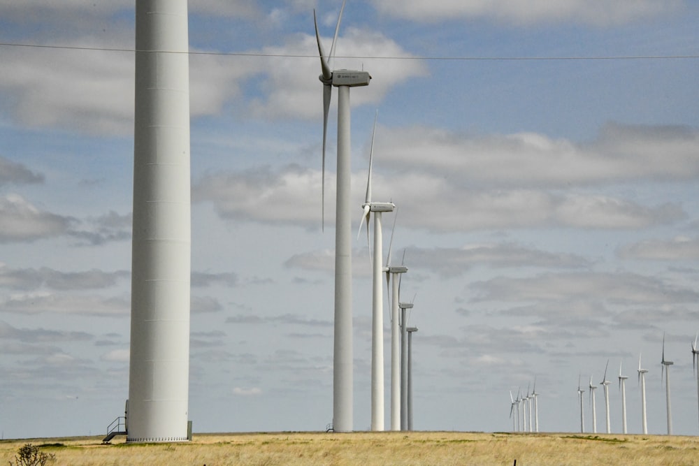 white windmills under blue sky