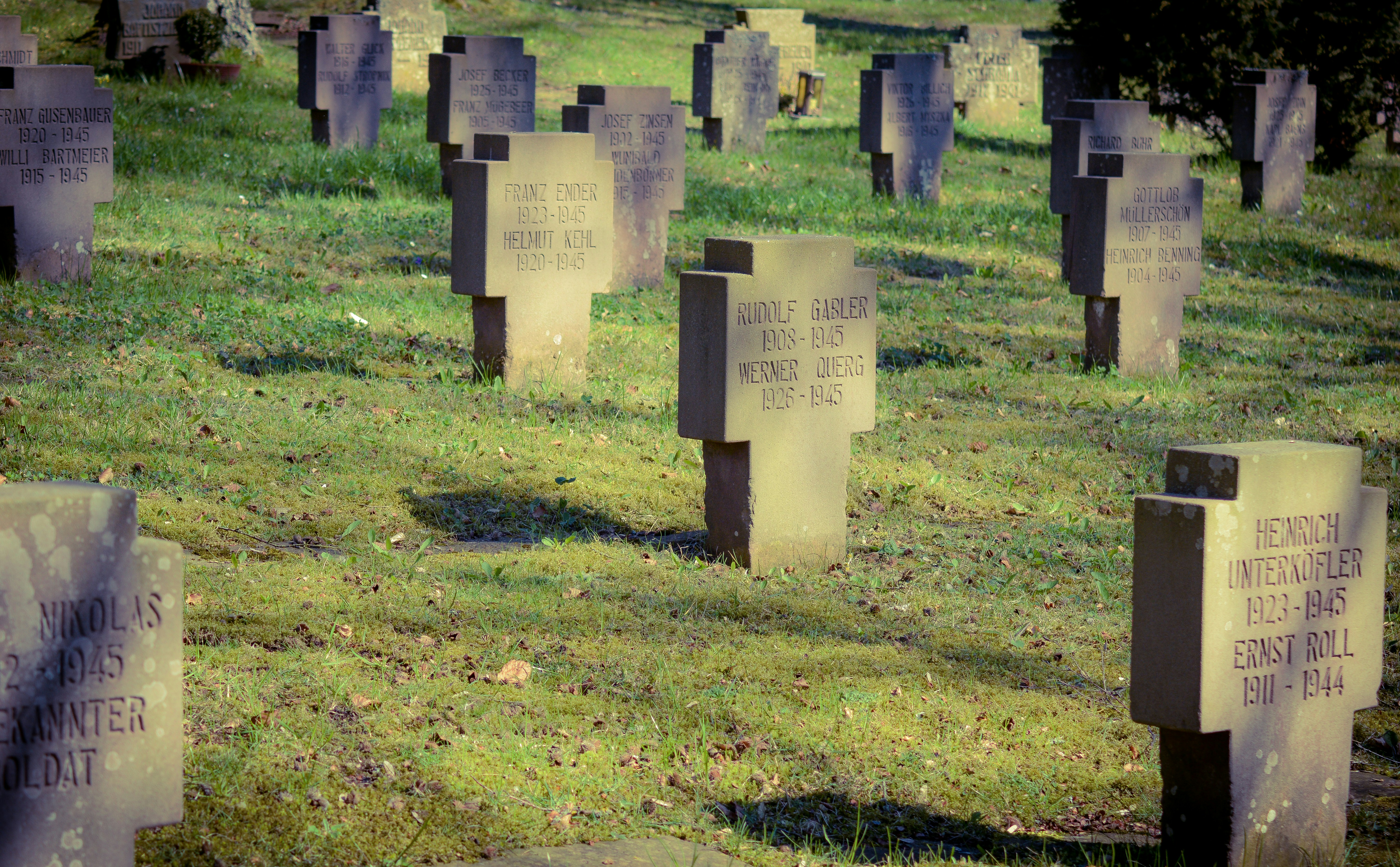 cross on cemetery at daytime
