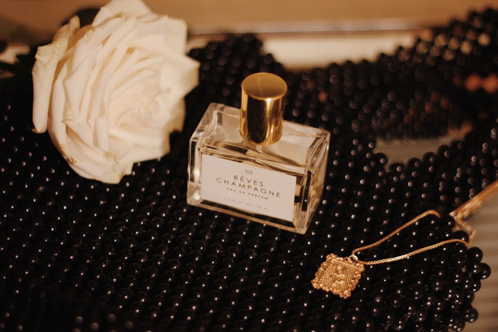 fragrance bottle on black surface