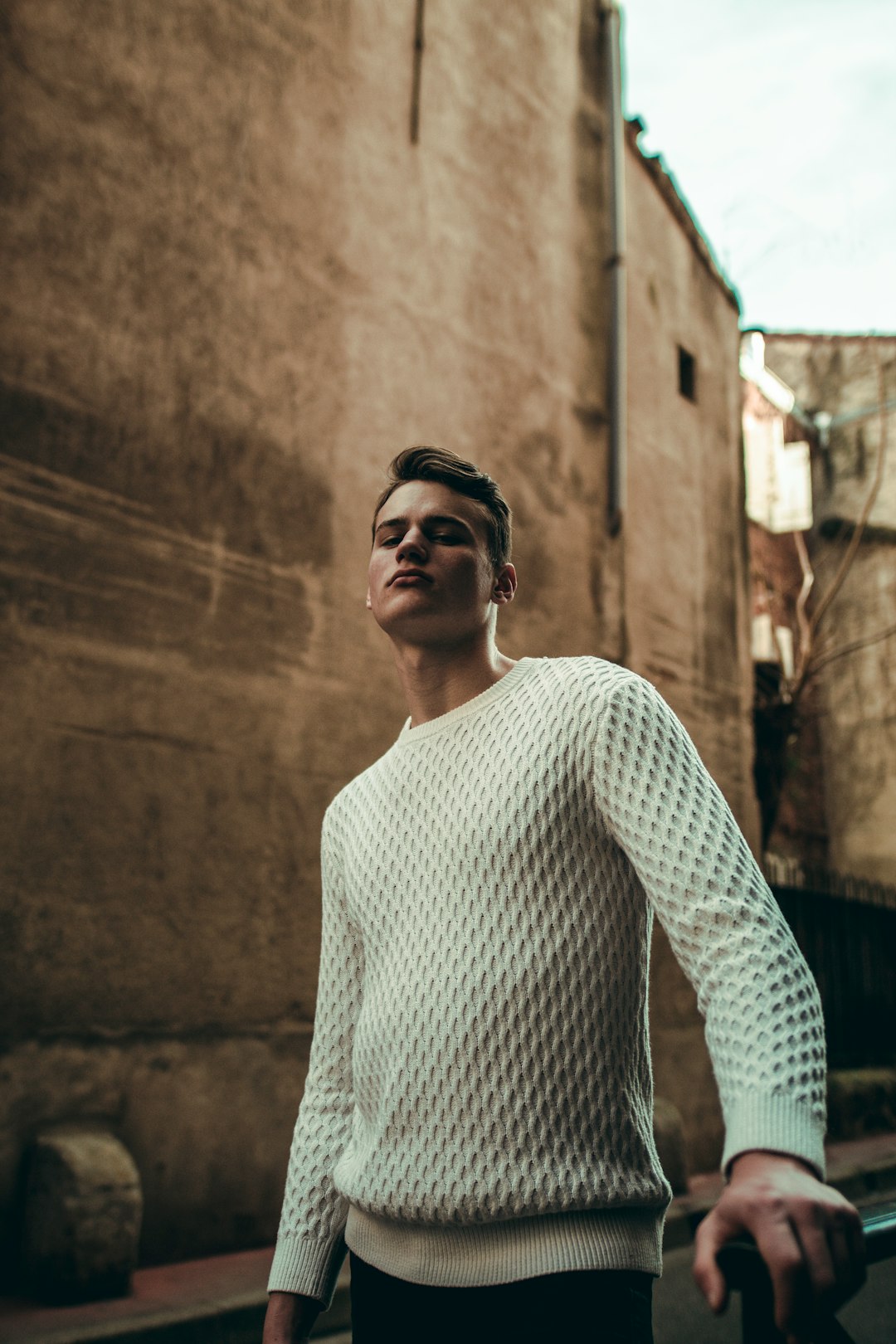 man standing near wall