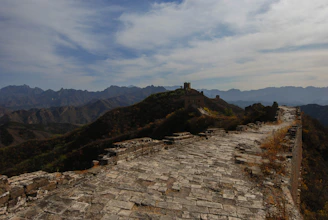 An old map overlay showing the Great Wall of China alongside the layout of Crews Hole Road woodland.