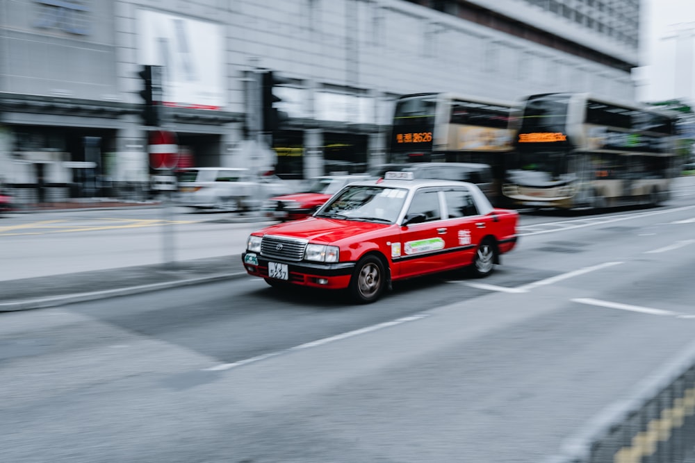 red car on road