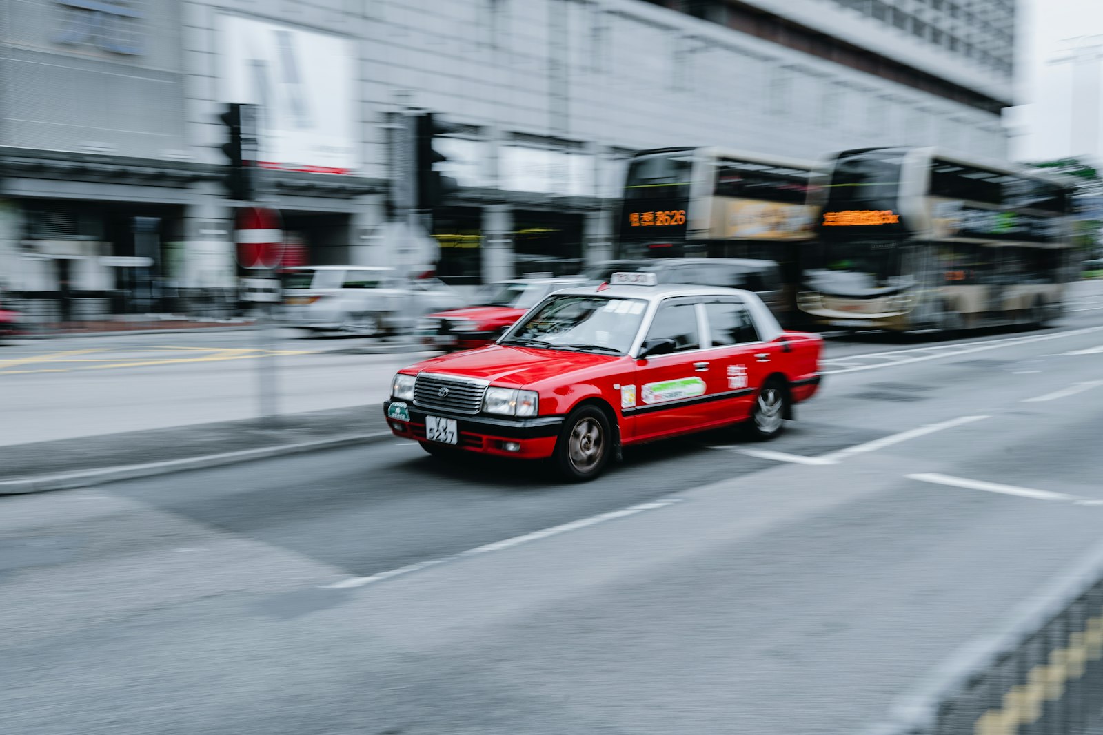 Sony a7 III + Sigma 35mm F1.4 DG HSM Art sample photo. Red car on road photography