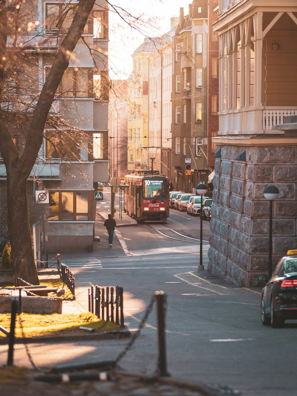 red bus on road