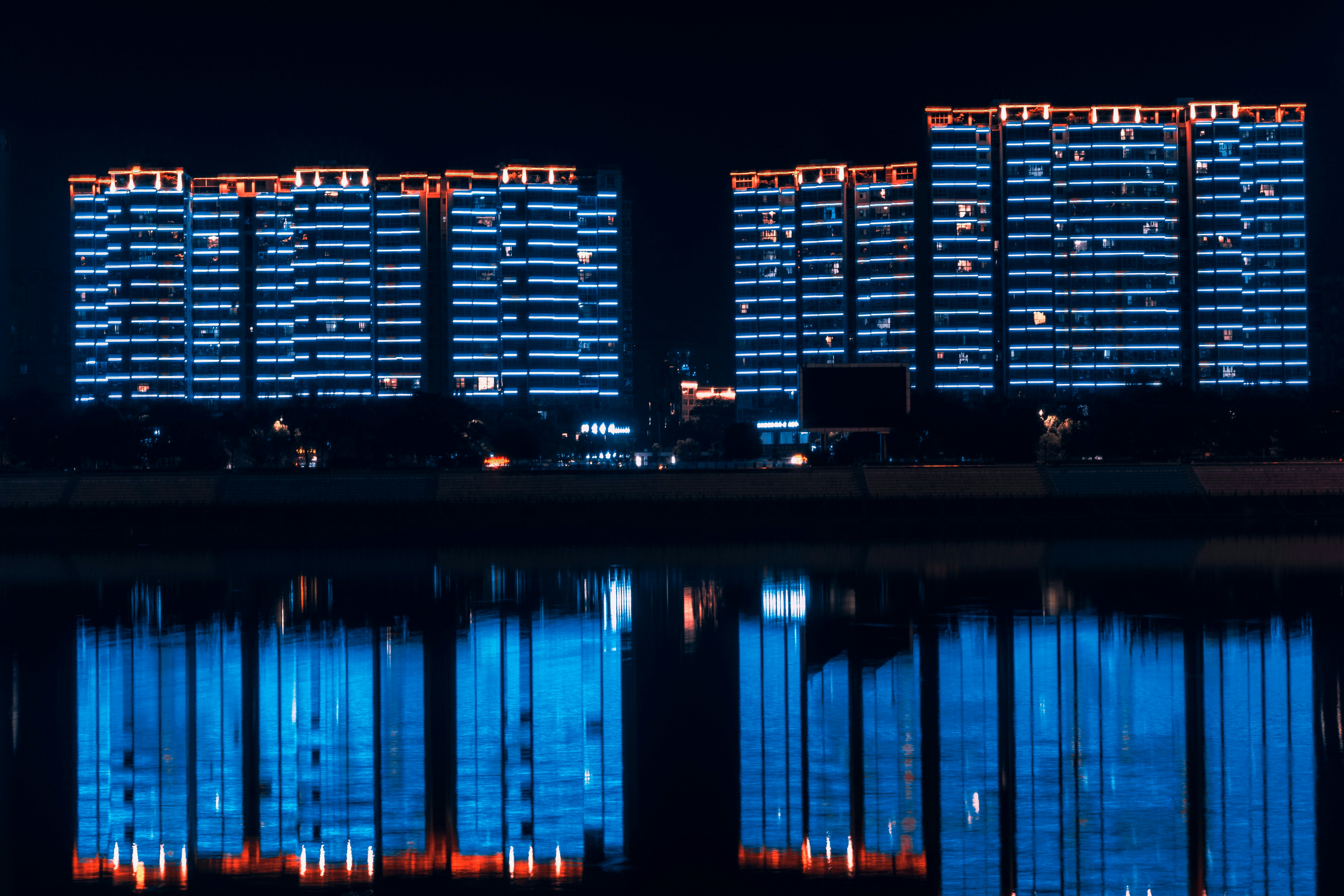 body of water across city lights