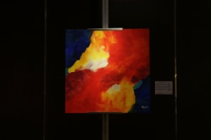 A colorful abstract painting with bold brush strokes.