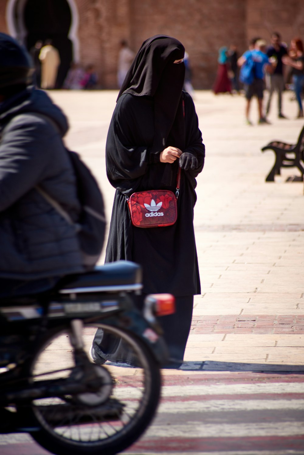 woman wearing black abaya dress during daytime