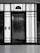 A modern elevator is centered between illuminated panels with a minimalist, geometric design. The elevator doors are metallic and closed, with control buttons on either side. Above the doors, a display shows the number 3.