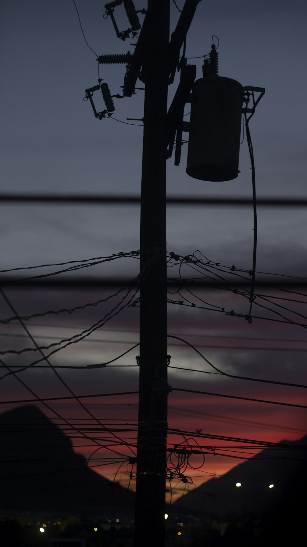 selective focus photography of electric post