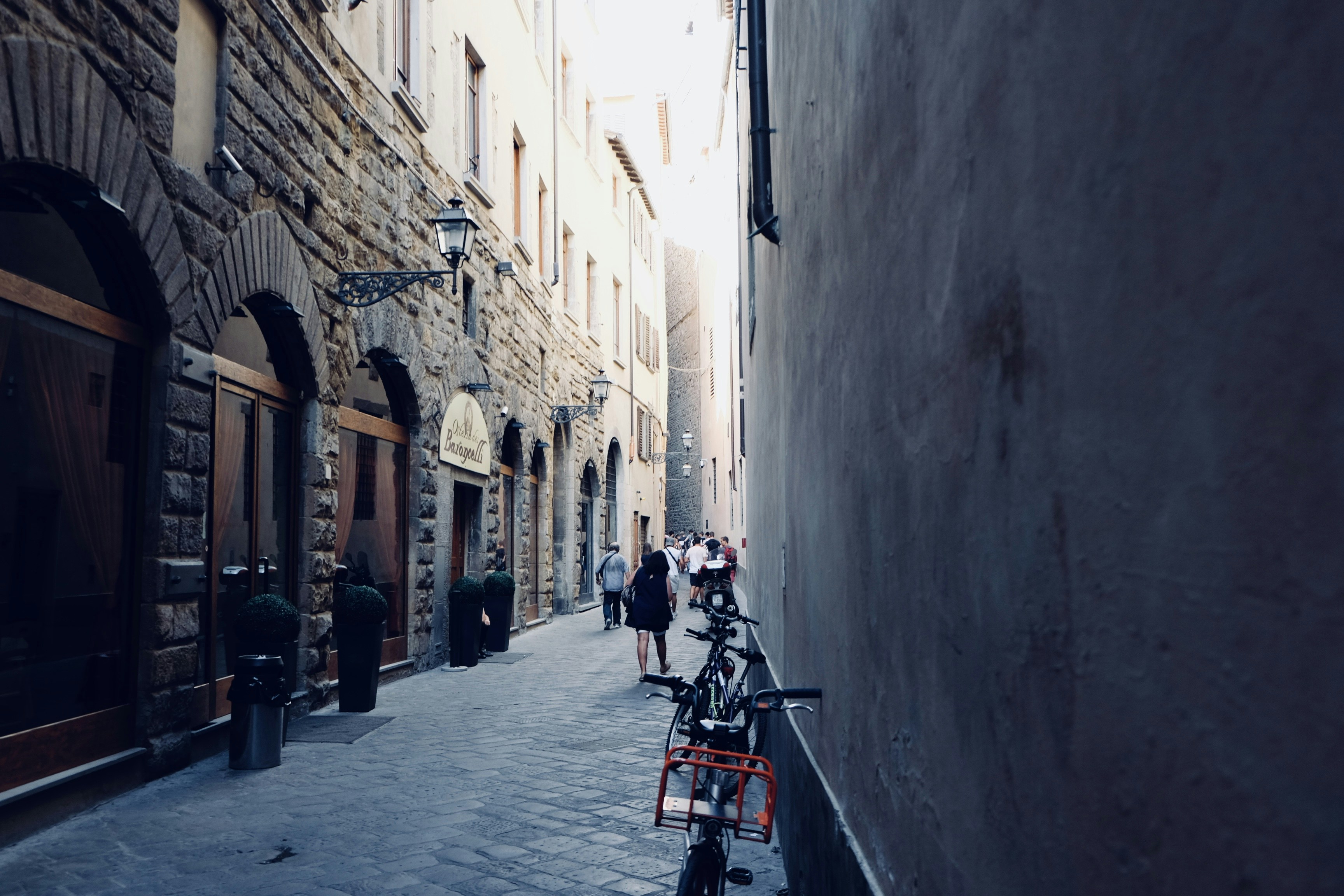 Bike parked beside wall