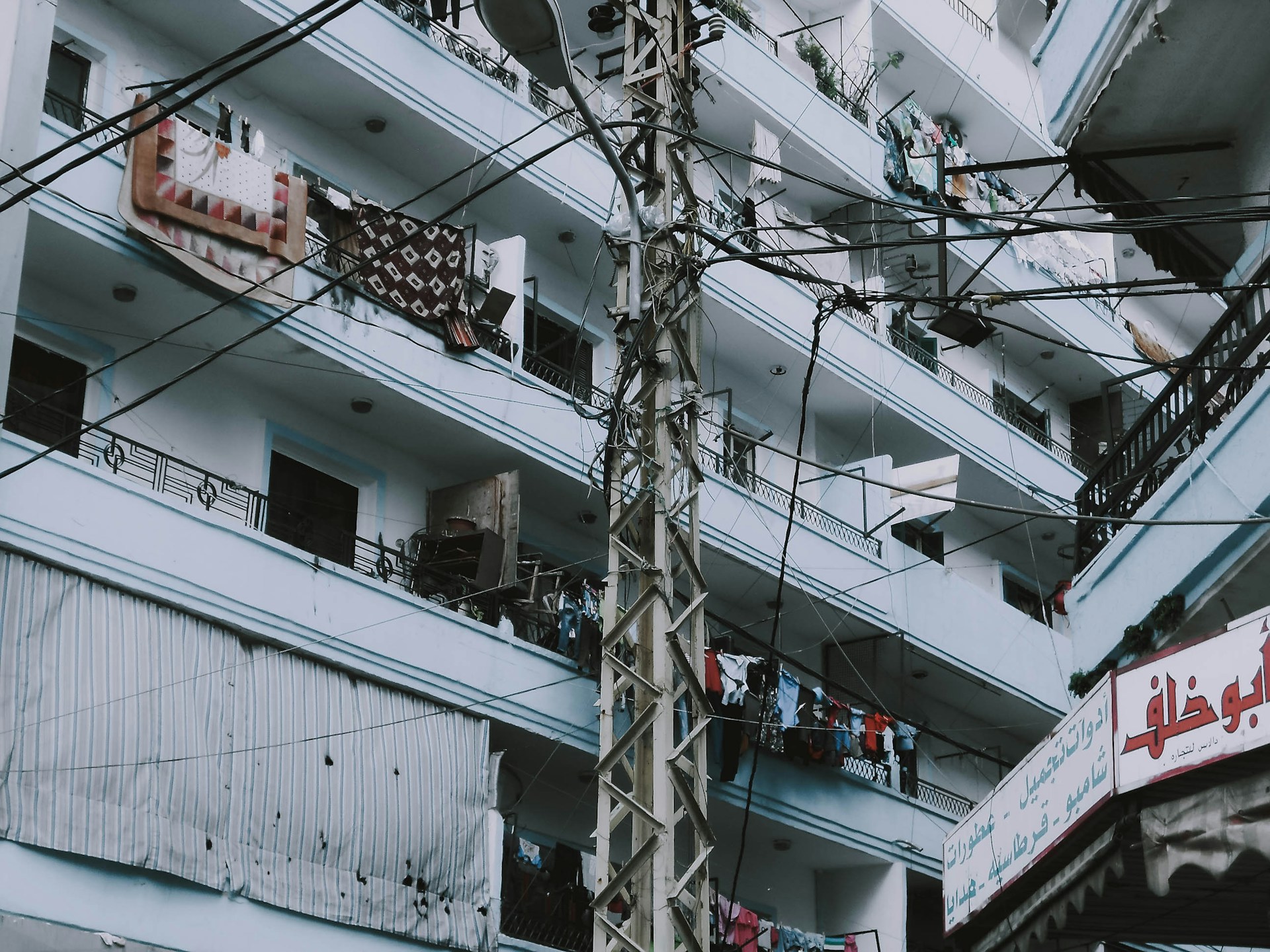 woman wearing yellow long-sleeved dress under white clouds and blue sky during daytime