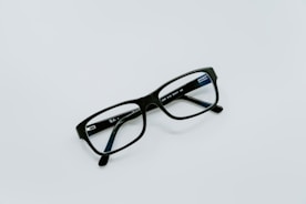 black-framed eyeglasses