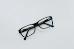 black-framed eyeglasses
