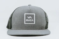 A classic trucker cap with a vibrant custom logo embroidered on the front panel.