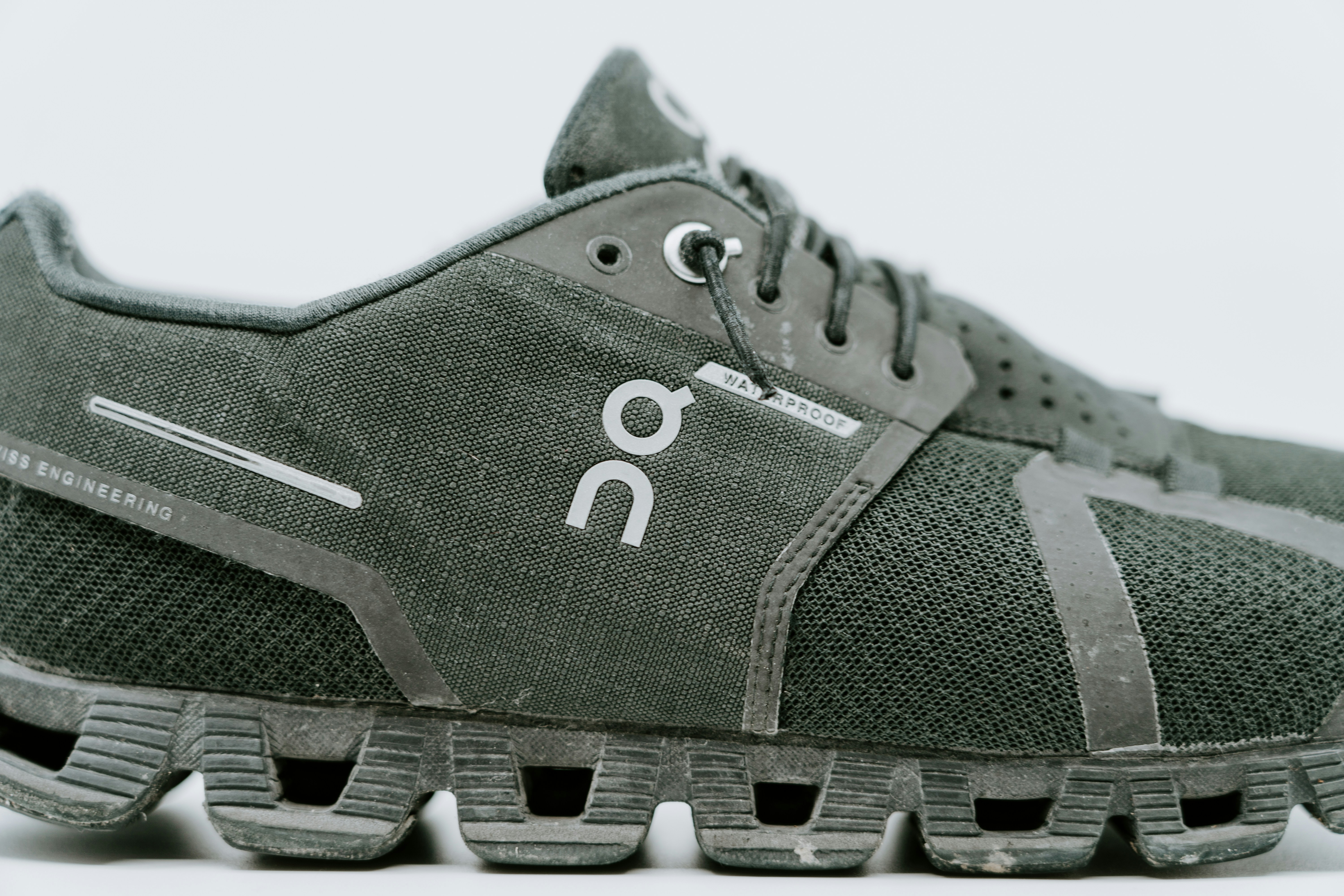 Unpaired gray DQ laceup athletic shoe photo Free Grey Image on Unsplash
