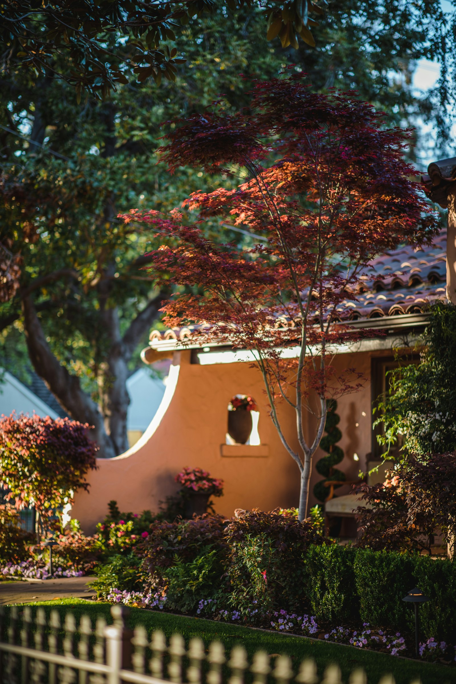 Canon EF 85mm F1.4L IS USM sample photo. House surrounded of trees photography