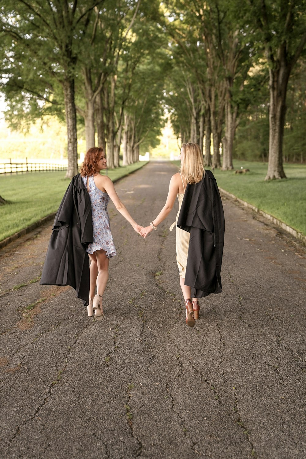 women on road in park