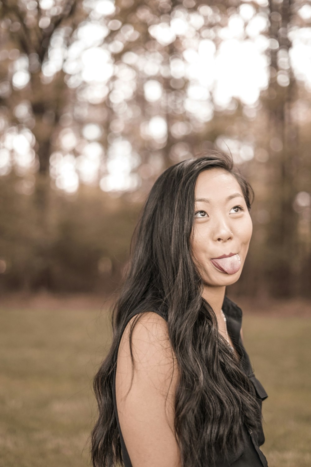 portrait of a woman with her tongue sticking out