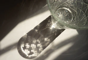 Finished glass products reflecting sunlight, showcasing clarity and strength