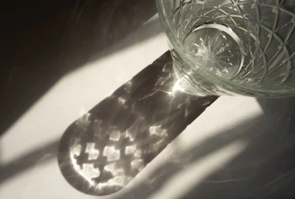 Finished glass products reflecting sunlight, showcasing clarity and strength