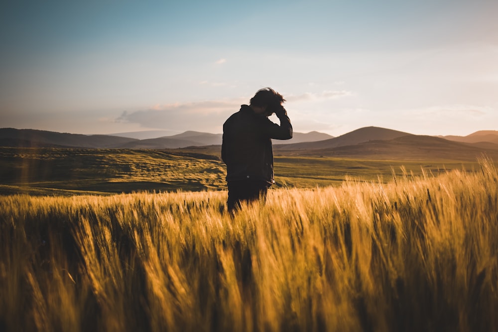 man standing on field